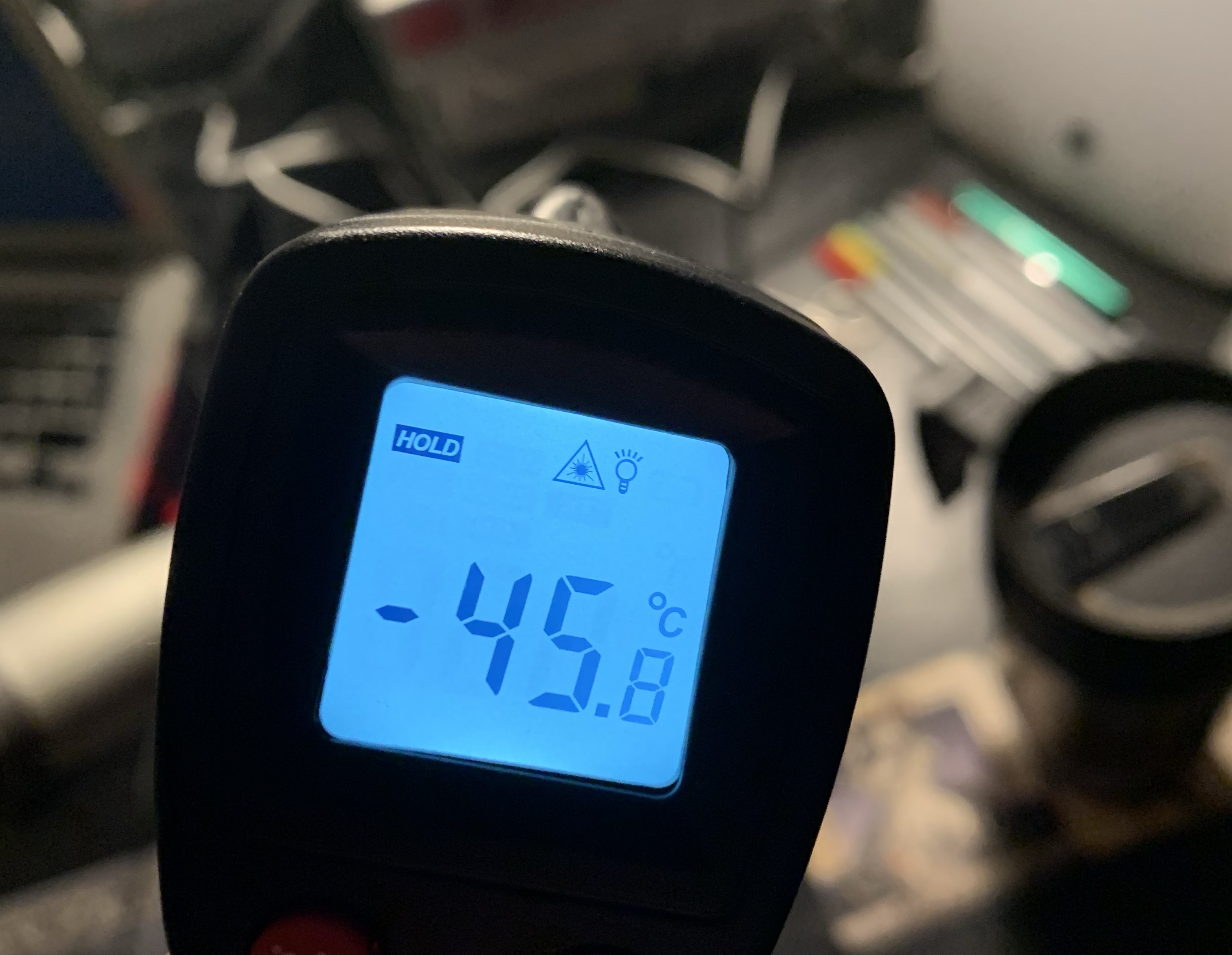 Infrared thermometer showing a temperature of -45.8 Celsius